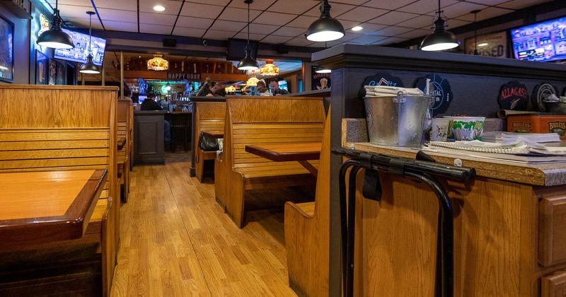 Interior, wooden booths ready for guests