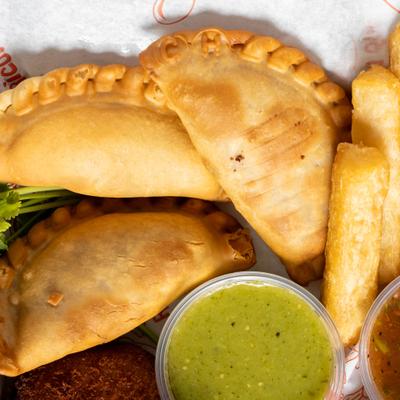 Empanadas, yuca fries, and salsas.
