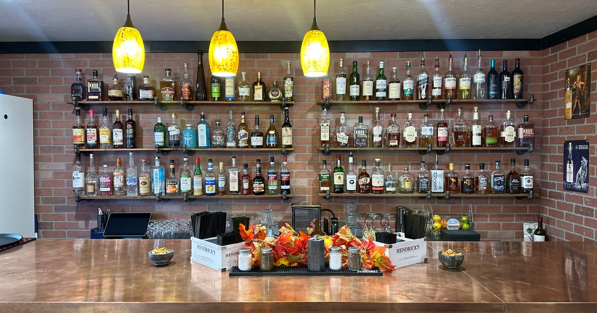 Bar area, various liquor bottles on the shelf