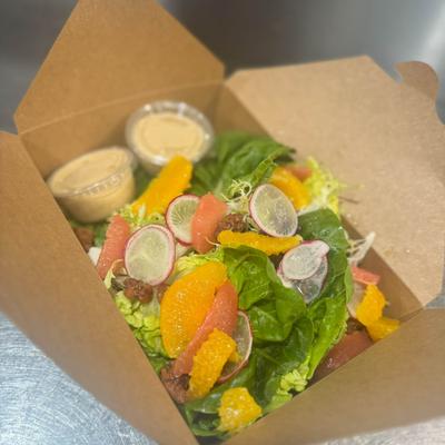 Antipasto salad in a box to go.