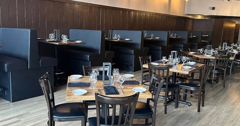 Interior, dining area wit tables and chairs, dining booths