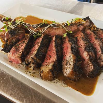 Medium rare tomahawk steak.