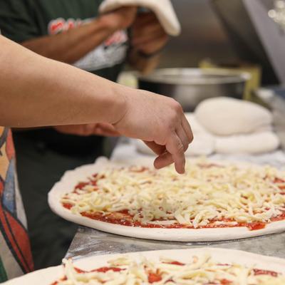 Pizza preparation process.