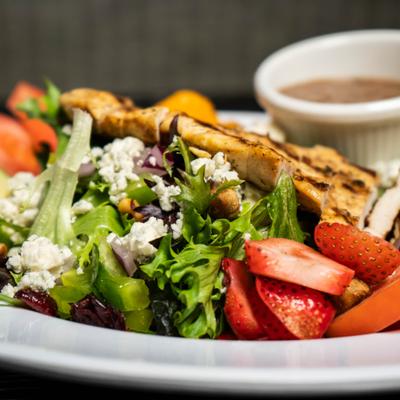 Balsamic Chicken Salad with sauce, closeup.