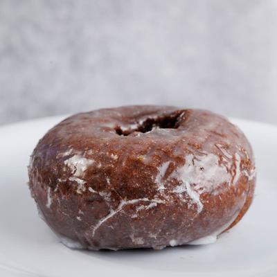 Chocolate glazed cake donut.