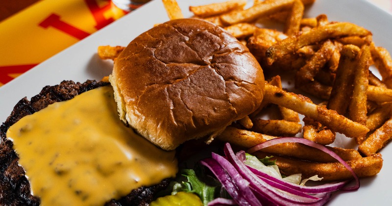 A serving of Angus Burger with fries