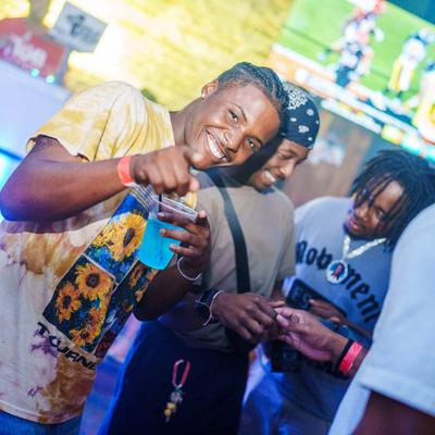 People holding drinks.