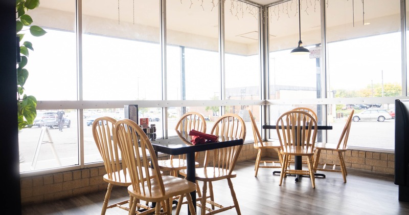Dining tables by the big windows
