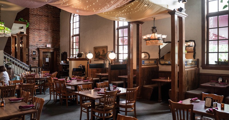 Restaurant interior, dining area with set tables