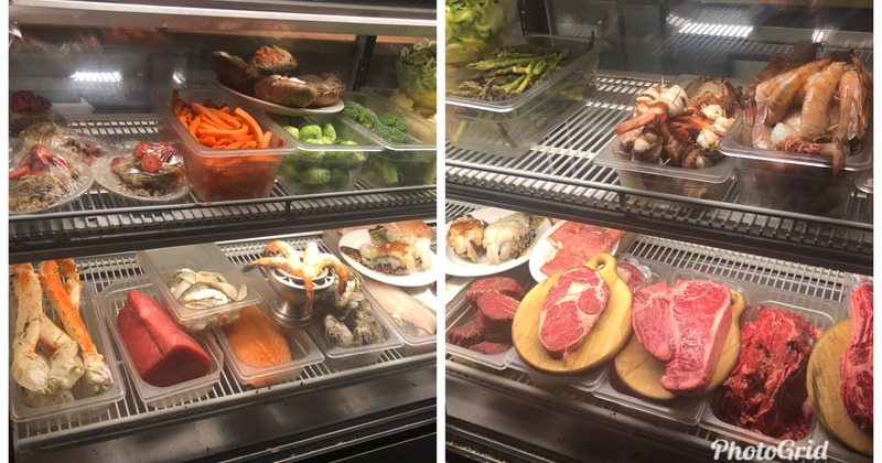 Dishes and raw meat in a display fridge