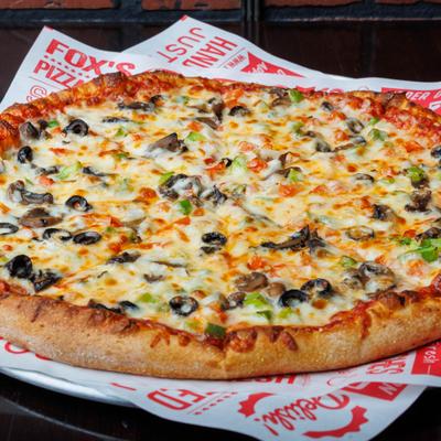 Veggie pizza with mushrooms, peppers, and olives.