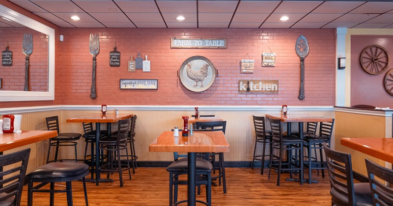 Interior, high tables and chairs in dining area