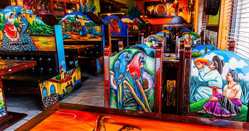 Interior, colorful chairs in seating area