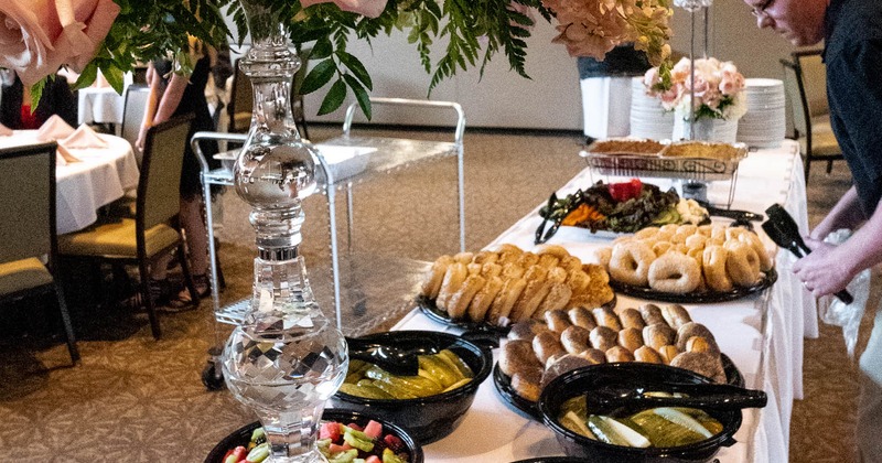Person in front of a buffet
