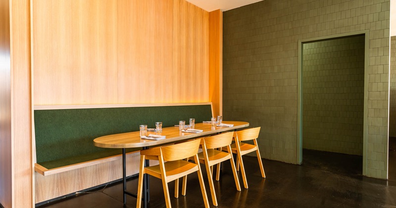 Interior, wall seating with table and chairs