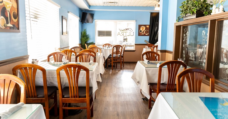 Nicely done interior dining area with set tables