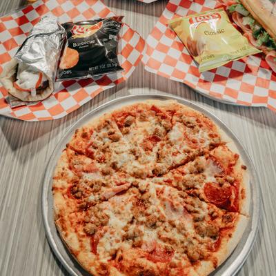 Meat Lovers pizza, gyro pita, and a Philly cheese steak.