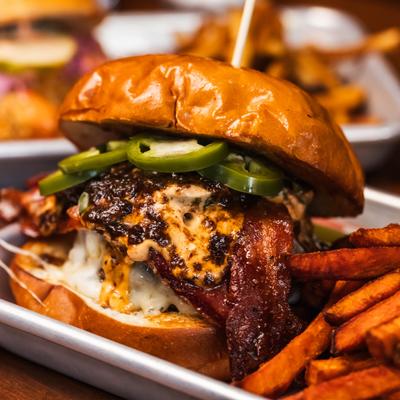 Chipotle Jam Burger served with fries.