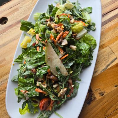 Pearfectly Peared Greens with chicken breast, bacon, pears and blue cheese crumbles.