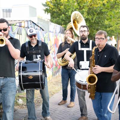 Brass band playing outside.