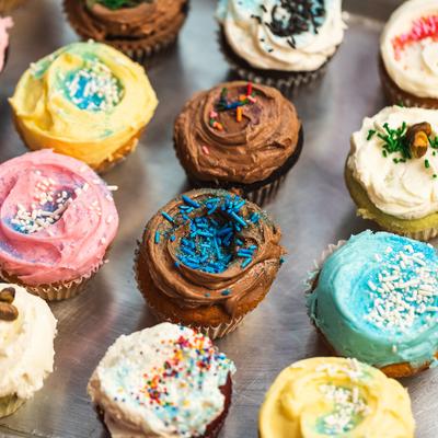 Multi colored cupcakes, close up.