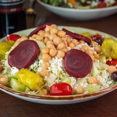 Greek salad, served.
