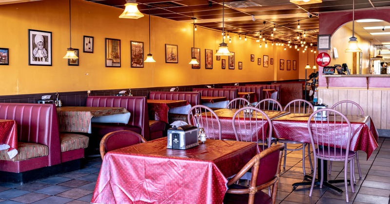 Dining area, tables and booths behind