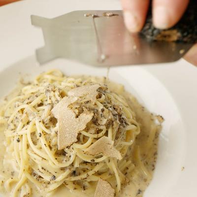 Pasta finished with freshly shaved truffle.