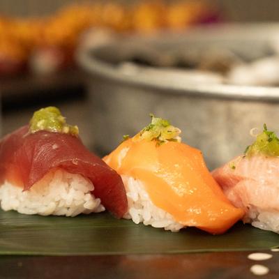 Yellowtail, tuna, and salmon nigiri.