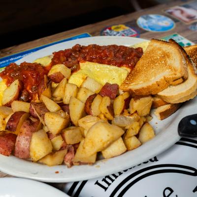Mexican Omelet, with onions, peppers, tomatoes, salsa, and pepper jack cheese.