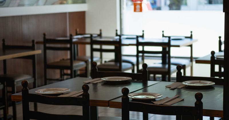 Interior, dining area, tables set for guests