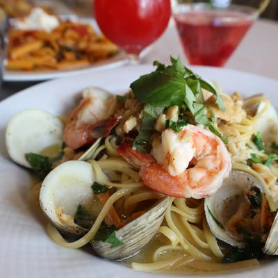 Jumbo shrimp and clams over linguine, in a white clam sauce.