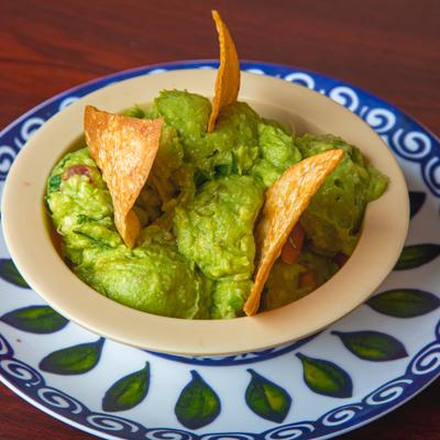 Guacamole served with tortilla chips.