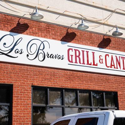 The restaurant's name on the side of the building.