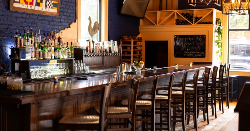 Bar area, neatly lined up bar stools