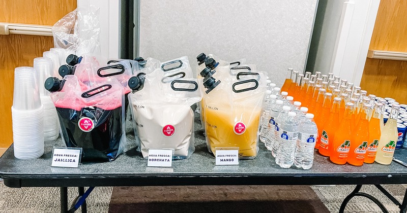 A table with assorted bottled beverages