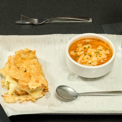 Cheese melt served with tomato soup.