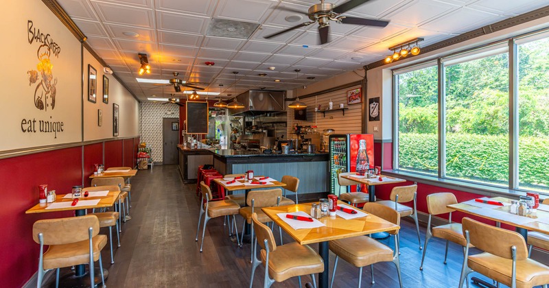 Interior, tables ready for guests