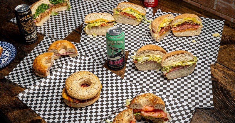 Variety of bagels and sandwiches served on the table