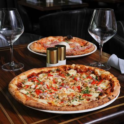 BBQ Chicken and Prosciutto and Burrata pizza