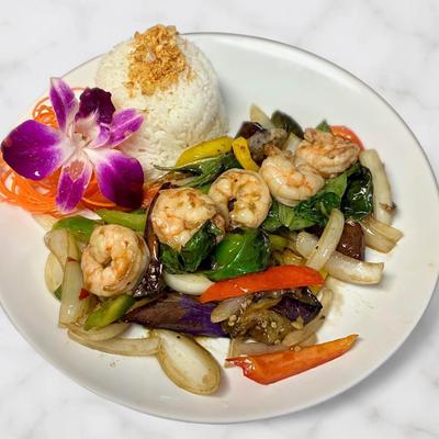 Thai stir-fried shrimp with eggplant, peppers, and onions, served with steamed white rice.