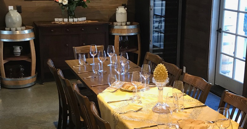 Interior, a table decorated and  set for dining