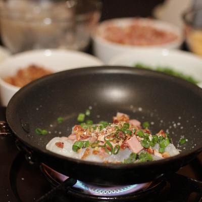Dish frying in a pan.