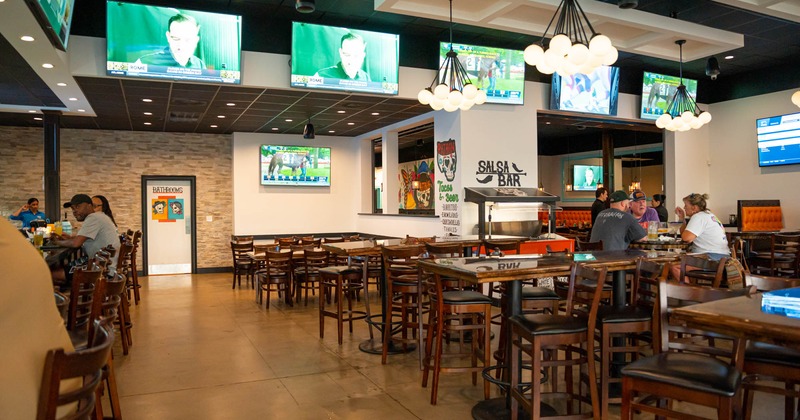 Interior, guests dining in the dining area