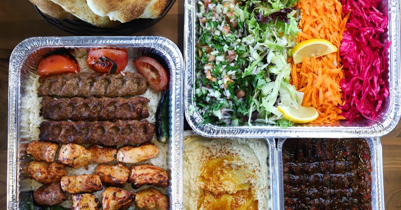 Assorted catering food trays, top view