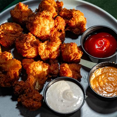 Fried Cailflower served with three dipping sauces.