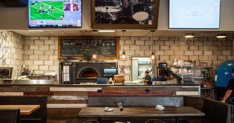 Dining area with pizza oven in the back