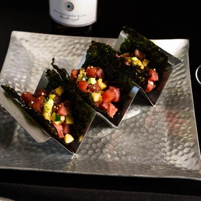Tuna tacos in seaweed shell.