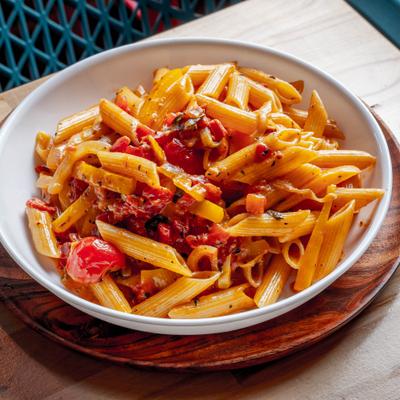 Penne pasta with creamy tomato sauce.