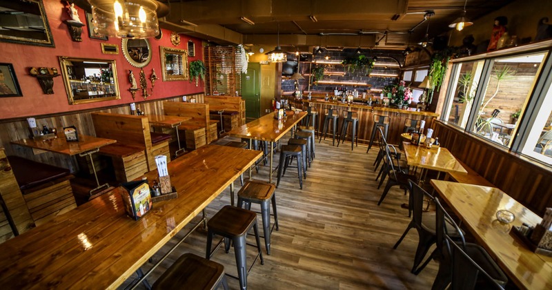 Interior, wooden tables, chairs and benches